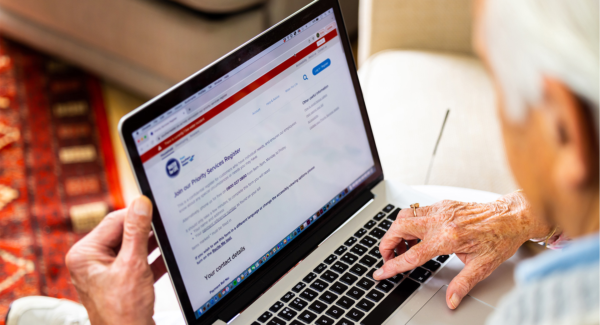 Elderly customer looking at the Southern Water website
                        